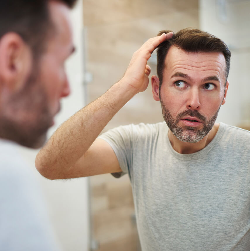 mature-men-is-worried-about-hair-loss-2024-12-01-00-18-36-utc (1)